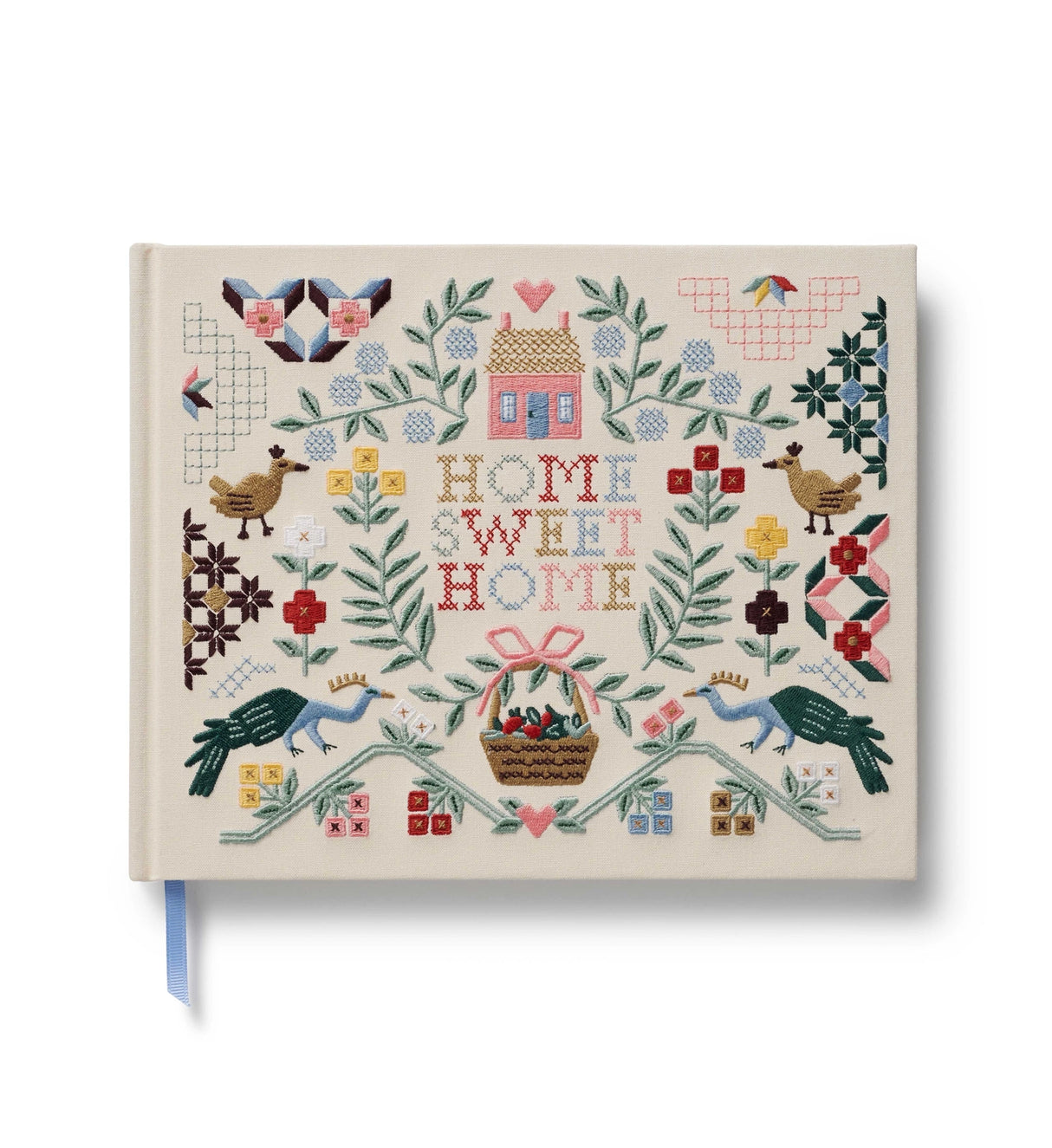 A one-of-a-kind keepsake, our embroidered guest book is a large, hardcover journal with 144 interior pages, half lined and half blank so guests can write a note, add a sketch, or paste a photo. The cover is wrapped in book cloth and embroidered. A grosgrain ribbon bookmark saves your place.

DETAILS
- Book cloth cover with 100gsm ivory uncoated paper
- Natural white text paper
- Embroidery on front cover
- Grosgrain ribbon bookmark
- 144 lined and blank pages
- Lay-flat finding
- Acid free paper
- 10.25" W 