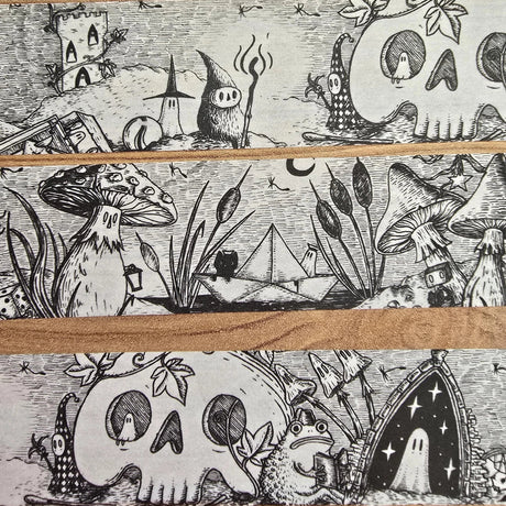 A unique and infinitely repeating fantasy landscape of melancholy oddities and curious characters, from original hand-drawn ink artwork by Jon Turner, recreated with incredible detail at miniature size in this washi tape that invites you to find new tiny details with every viewing.

This is a special extra-wide washi tape, 30mm high which really brings out all the tiny details. perfect for creating a decorative border when journalling, or for packing parcels with surreal style. 10m long.