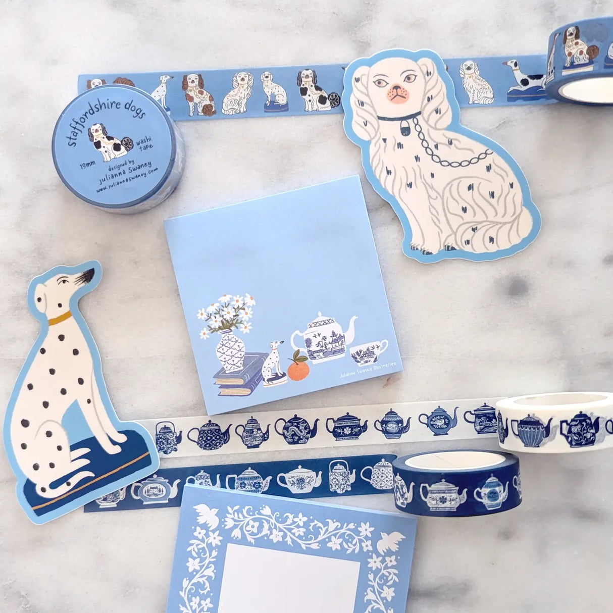 A simple sticky notepad for jotting down to-do's, grocery lists, or whatever you need to remember. Illustrated with a willow pattern tea set, Staffordsire dalmatian figurine, and vase of daisies.