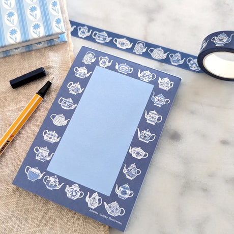 A simple tear away notepad for jotting down to do lists, things to remember, or a short Thank-You note. Illustrated with many different styles of blue and white teapots.
