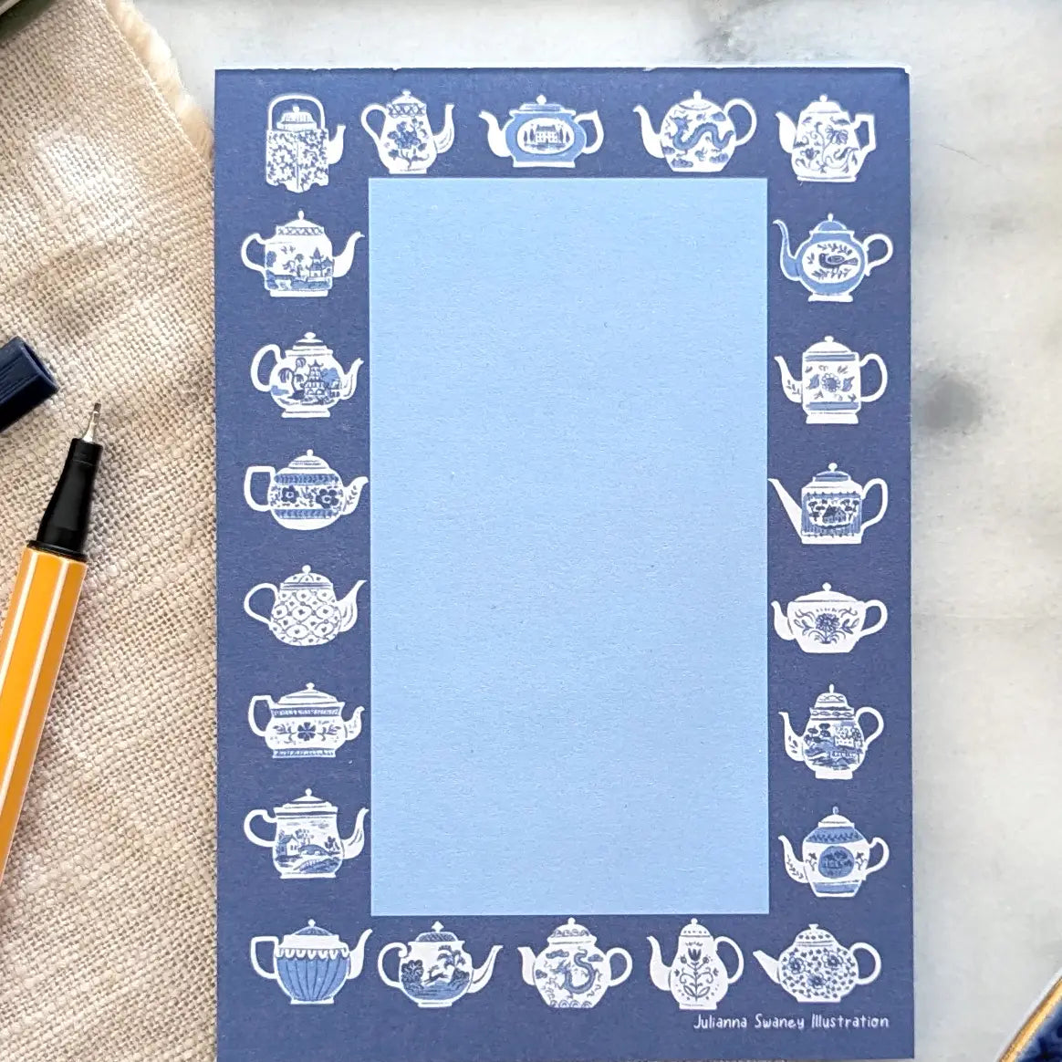 A simple tear away notepad for jotting down to do lists, things to remember, or a short Thank-You note. Illustrated with many different styles of blue and white teapots.