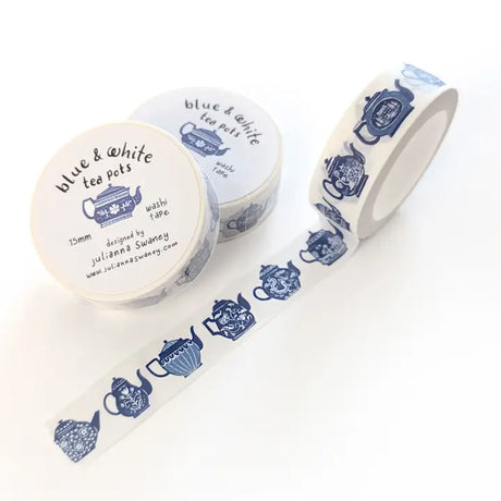 This tea themed washi tape is made from my original illustrations and it features a continuous parade of different styles of blue and white teapots on a white background.