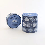 This tea themed washi tape is made from my original illustrations, and it features a continuous parade of different styles of blue and white teapots on a blue background.