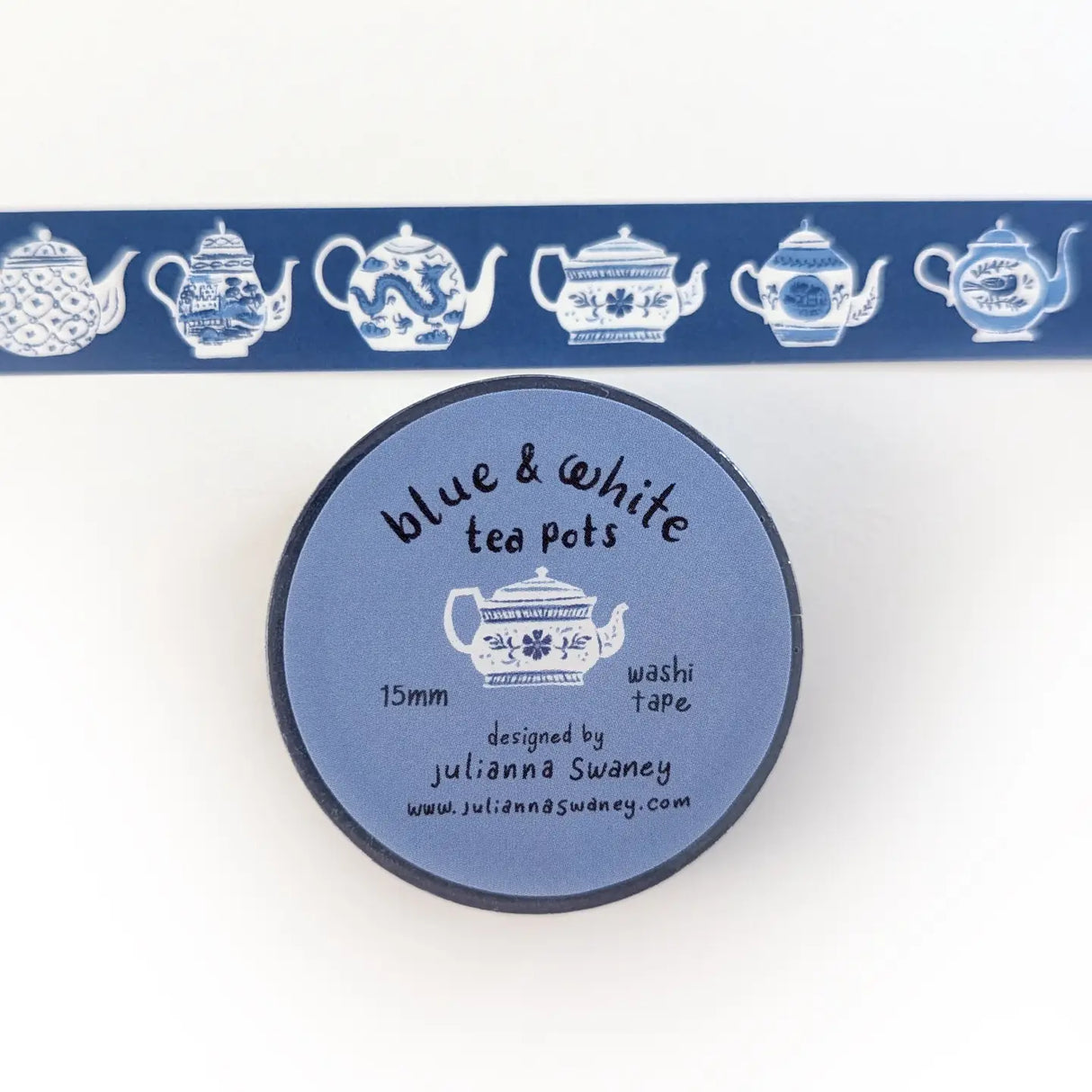 This tea themed washi tape is made from my original illustrations, and it features a continuous parade of different styles of blue and white teapots on a blue background.