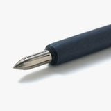 The stainless steel nib was born from a desire for a durable and practical dip pen nib. Enjoy a variety of line widths from fine to broad by tilting the nib at different angles. Fits most nib holders as well as those from our range.

The nib was designed by Yuto Yamazaki of Kuramae-based design studio Alloy. The nib tip has been rounded and polished with meticulous care, providing a remarkably smooth writing experience that defies expectation. Perfected over many iterations, the innovative nib is like no ot