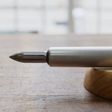 The stainless steel nib was born from a desire for a durable and practical dip pen nib. Enjoy a variety of line widths from fine to broad by tilting the nib at different angles. Fits most nib holders as well as those from our range.

The nib was designed by Yuto Yamazaki of Kuramae-based design studio Alloy. The nib tip has been rounded and polished with meticulous care, providing a remarkably smooth writing experience that defies expectation. Perfected over many iterations, the innovative nib is like no ot