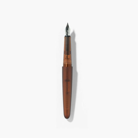 A pen that evokes the texture of frosted glass. Its translucency reveals the internal mechanism as an aesthetic feature. Careful consideration of form and colour palette ensures an elegant presence, even when not in use.&nbsp;

The pen is equipped with thoughtful functionality, including an extended grip section and a screw cap designed for quick access with minimal turns. The visible ink level allows for easy refills.

Available in a Fine and Medium nib
Includes converter
Steel nib