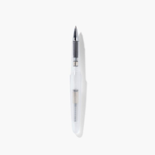 A pen that evokes the texture of frosted glass. Its translucency reveals the internal mechanism as an aesthetic feature. Careful consideration of form and colour palette ensures an elegant presence, even when not in use.&nbsp;

The pen is equipped with thoughtful functionality, including an extended grip section and a screw cap designed for quick access with minimal turns. The visible ink level allows for easy refills.

0.5mm
Includes converter