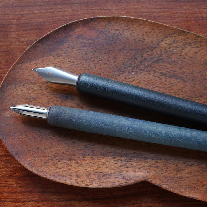A nib holder that emerged from our desire to create a tool that inspires a lifetime of use, bringing joy to our hands and soul. From the timeless material to the comfortable thickness, form and length, each and every detail has been carefully considered to create a perfect fit. The 7-inch length is similar to that of a standard pencil. Designed to universal specifications to fit all standard nibs, the nib holder will travel with you for a lifetime of writing.&nbsp;

A nib holder crafted from Japanese cherry