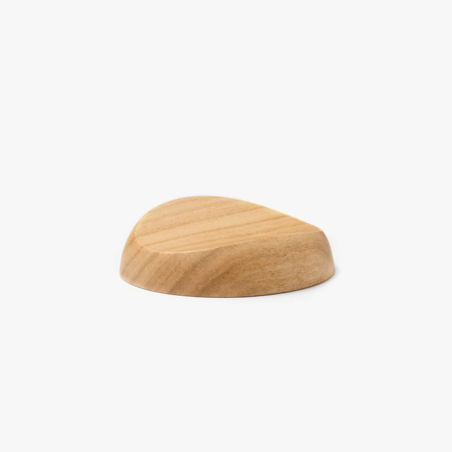 A pen rest that enhances the moments between writing. Designed to hold any pen without the need for precise placement, it blends effortlessly into your desk space with a subtle but assured presence. Enjoy the rich texture and wood grain of Japanese cherry.

Designed for stability to ensure your pens and surfaces are protected from accidental movement or damage. The pen rest comfortably holds two to three slender pens.

Use and Care:

To prevent distortion and discolouration, avoid soaking in water, sudden t