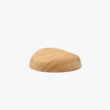 A pen rest that enhances the moments between writing. Designed to hold any pen without the need for precise placement, it blends effortlessly into your desk space with a subtle but assured presence. Enjoy the rich texture and wood grain of Japanese cherry.

Designed for stability to ensure your pens and surfaces are protected from accidental movement or damage. The pen rest comfortably holds two to three slender pens.

Use and Care:

To prevent distortion and discolouration, avoid soaking in water, sudden t