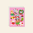 Karen Schipper Greeting Card - Christmas Cats

A pink holiday scene packed with cats in sweaters, scarves, stockings, bows, lights, and gift boxes makes this design feel instantly merry. This hand-illustrated Christmas Cats holiday card brings together playful feline characters and festive details, making it a cheerful pick for cat lovers and those who want a Christmas card with extra personality. 

A2 folded card, 4.25" W × 5.5" L
Printed in full color on FSC® certified white cover paper
Blank interior
Sin