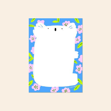 Karen Schipper Notepad - Kayla Koala

Add a sweet, cheerful touch to everyday note-taking with the Kayla Koala Notepad, a cute koala floral notepad featuring a charming koala silhouette framed by soft blooms and fresh color. The playful design feels bright and giftable while still being practical for notes, lists, and daily reminders.

Size: 5" x 7"
50 tear-off sheets&nbsp;
Padded with cardboard back
Printed locally in the US
Designed by Karen Schipper