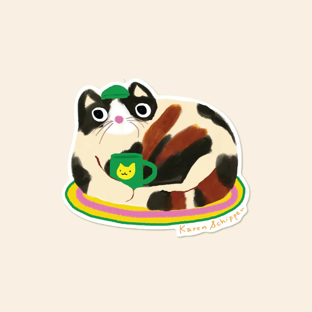 Some stickers feel like a mood — and this cat sticker is exactly that. Coffee Cat Sticker features a chunky calico lounging with a bright green mug, making it the perfect coffee lover sticker for customers who can’t start the day without caffeine and cats.

Made from matte-coated, waterproof vinyl, it’s durable enough for laptops, planners, water bottles, and more. It’s an easy impulse add-on for cat people, best friends, and shoppers looking for a small but meaningful gift.

Measures approximately 3 inches
