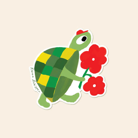 Karen Schipper Vinyl Sticker - Turtle Flowers

Sweet, cheerful, and full of character, the Turtle Flowers Vinyl Sticker brings a splash of color and whimsy to any surface. A friendly turtle carries bright red blooms on its patterned green shell, capturing Karen Schipper’s playful hand-drawn style.

Made from matte-coated, waterproof vinyl, it’s durable enough for laptops, planners, water bottles, and more. It’s an easy impulse add-on for cat people, best friends, and shoppers looking for a small but meaning