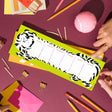 Karen Schipper Weekly Desk Planner - Tilda Tiger

Add bold, playful energy to weekly planning with the Tilda Tiger Desk Planner, an illustrated weekly planner pad featuring a striking tiger design with each section labeled for the days of the week. The long horizontal format makes it both eye-catching on a desk and practical for mapping out tasks, appointments, and weekly reminders.

It comes with 52 undated sheets, enough to last you the year.
Professionally printed full color
Size: 11.75 x 4.25 inches
52 
