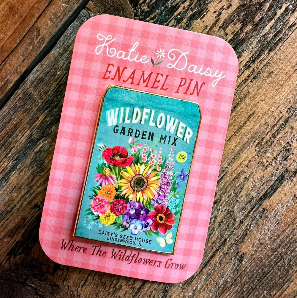 Seed Packet Enamel Pin by Katie Daisy

A tiny treasure to pin on your jacket, tote, or favorite old flannel—each one a little love letter to country delights, small joys, and the art of noticing.