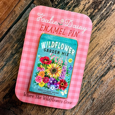 Seed Packet Enamel Pin by Katie Daisy

A tiny treasure to pin on your jacket, tote, or favorite old flannel—each one a little love letter to country delights, small joys, and the art of noticing.