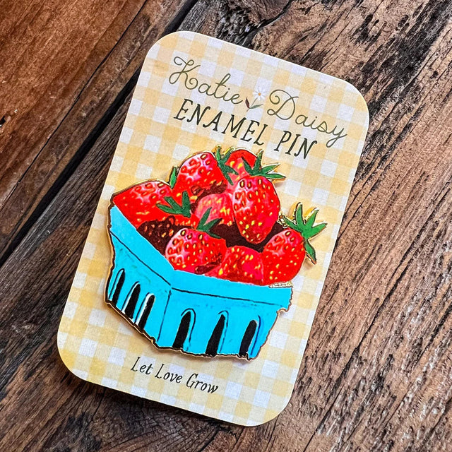 Strawberries Enamel Pin by Katie Daisy

A tiny treasure to pin on your jacket, tote, or favorite old flannel—each one a little love letter to country delights, small joys, and the art of noticing.