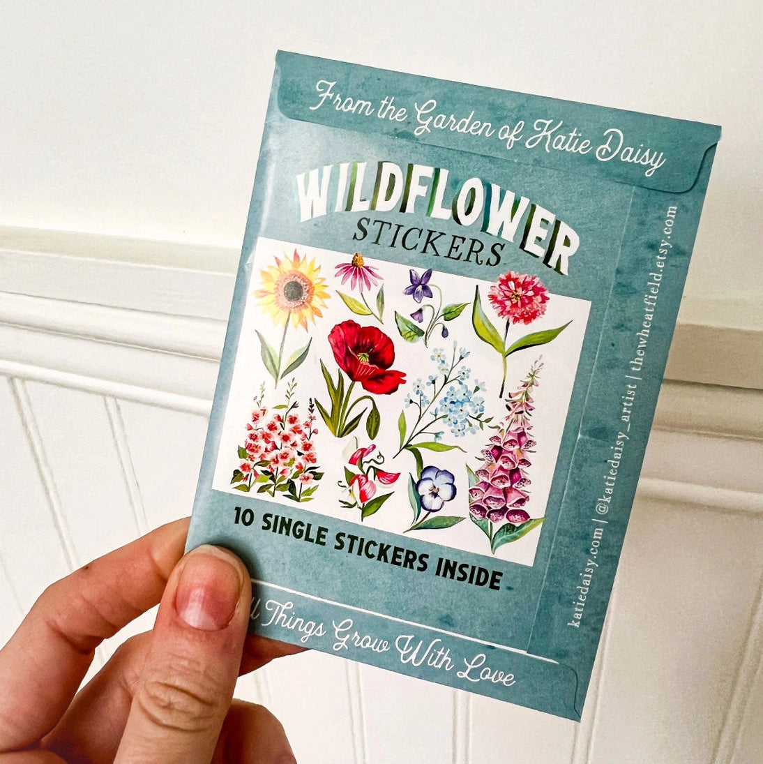 Wildflower Sticker Pack - Set of 10 Matte Stickers by Katie Daisy

From The Garden of Katie Daisy:

Adorn your laptop, water bottle, packages and so much more with this set of vibrant wildflower STICKERS!! You'll receive 10 floral stickers in a seed packet! (This listing is not for wildflower seeds ;) )