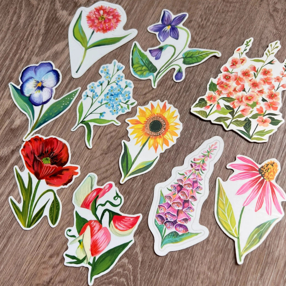 Wildflower Sticker Pack - Set of 10 Matte Stickers by Katie Daisy

From The Garden of Katie Daisy:

Adorn your laptop, water bottle, packages and so much more with this set of vibrant wildflower STICKERS!! You'll receive 10 floral stickers in a seed packet! (This listing is not for wildflower seeds ;) )