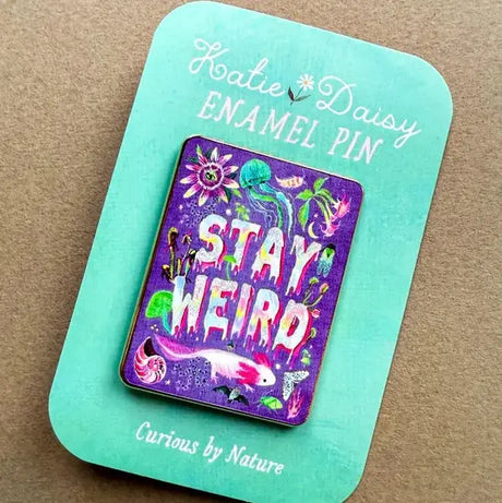Katie Daisy Enamel Pin - Stay Weird

A tiny treasure to pin on your jacket, tote, or favorite old flannel—each one a little love letter to country delights, small joys, and the art of noticing.

Details:
• 1.75” on the longest side
• Gold-plated finish
• Rich, detailed UV printing
• Double pin posts with sturdy metal backings
• Mounted on a backing card


Designed with love in my Oregon studio. Manufactured in China.
Collect them all or gift one to a kindred spirit. 🌸