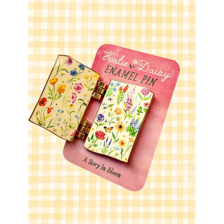 A tiny treasure for book lovers, wildflower wanderers, and collectors of small beautiful things.
This interactive enamel pin features a working hinge that allows the miniature book to open and close, revealing a hidden floral spread inside. Inspired by beloved vintage books and meadow blooms, it’s a little story you can wear on your jacket, tote, sweater, or favorite old flannel.

Details:
• 1.75” on the longest side
• Interactive hinged design that opens like a tiny book
• Gold-plated finish
• Rich, detail