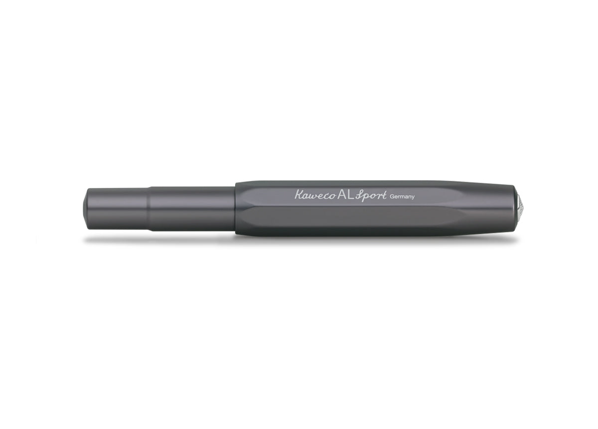 Contemporary design made of high-quality aluminium for an incomparable writing feel.

Our AL Sport roller ball anthracite is a pen to behold. The silky, glossy surface in a warm grey tone has an expressive and noble appeal. It is a perfect accessory for everyday use in the office, daily life, and leisure.

The metallic body is made of high-quality aluminium and grants an unique haptic experience. Its fine surface imparts elegance.

The Kaweco Sport was created in 1911. The pocket-sized roller ball pen only 