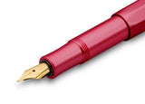 Just like the intricately cut facets of a ruby, the glossy polished surface of the fountain pen creates an exciting play of light on the octagonal shape. The refinement of the surface creates soft, rounded edges, which makes the writing instrument particularly comfortable to hold. A shadow engraving and the combination of aluminum with gold elements complements the elegant character of the pen. Included with this pen is a standard royal blue ink cartridge.&nbsp;
