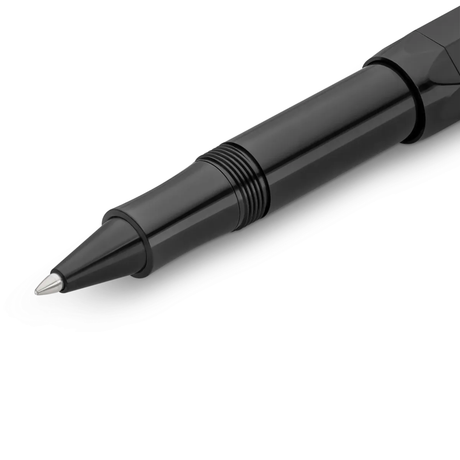 Kaweco CLASSIC SPORT Rollerball - Black

All black everything - our rollerball in black cuts a fine figure with everything. Elegant and classic, the colour can be combined with various notebooks, papers and other accessories.

The Kaweco Sport has been around since 1911. The rollerball for the bag has a size of only 10.5 cm when closed and grows to a normal size of 13 cm with the cap on.

The invention of the rollerball enables particularly easy and gliding writing. The gel flows uninterruptedly over the ce