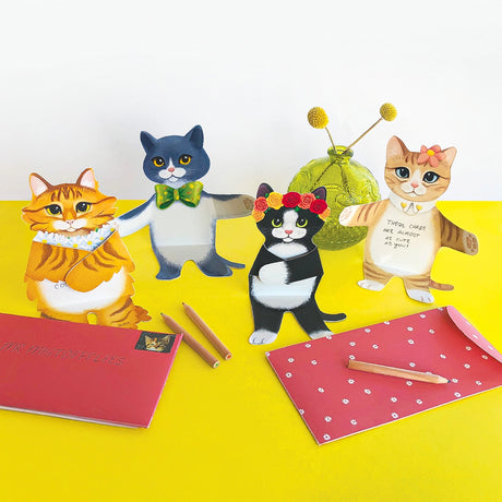 Kitten Cuddles Notecards

Fold your message into the paws of a cuddly kitten! With folded hugging arms and scored waists for a seated display, these 12 die-cut kitten cards are ready for sending paw-sitive thoughts and good mews.

Includes 12 note cards and envelopes