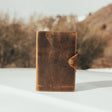 Kodiak Leather Drifter Leather Journal

The Drifter Leather Journal is designed for travelers, writers, and creatives who appreciate quality craftsmanship and timeless style. Made from top-grain leather, this beautifully crafted journal features a secure snap-button closure and handmade artisan paper, making it an ideal gift for adventurers and homebodies alike.

With 210 blank pages and a refillable design, it’s perfect for capturing thoughts, sketches, or travel memories. Measuring 7” x 5” x 2.5”, the Dri