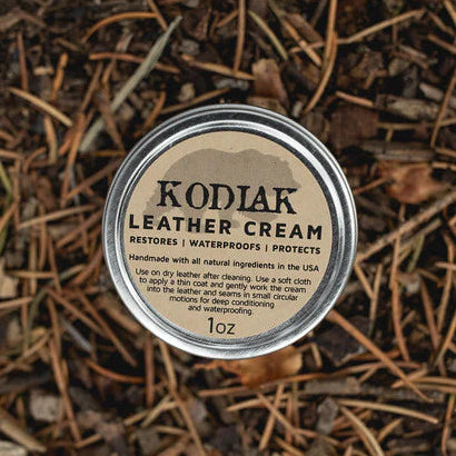 Kodiak Leather Cream - 1oz Tin

RESTORE | WATERPROOF | PROTECT

A light-thick cream with additional beeswax which provides superior waterproofing without heavy waxes.

Our handmade, all-natural, semi-thick wax conditioner offers maximum protection and restoration, adding years of life to your leather goods. Ideal for leathers that need extra protection, touched up, and those frequently exposed to the elements.

The convenient 1&nbsp;oz. size is perfect to keep in the car, boat, at work or where it's most ne