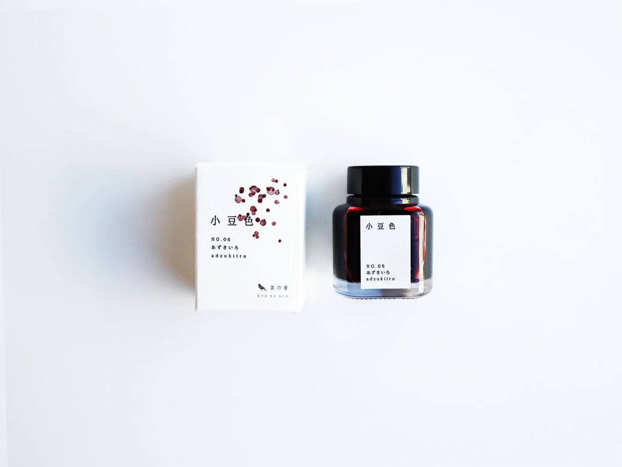 Azuki-iro refers to the purple-tinged reddish brown color of azuki beans. Red has long been used as a color of prayer, and red rice made with azuki beans is an indispensable item for celebrations and events.

Dye ink product number: KO-0106
Capacity: 40ml
Uses: fountain pens, pens, brushes