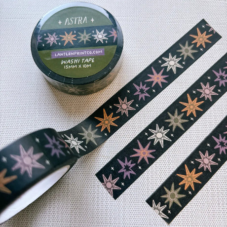 Removable Washi craft tape for journaling and crafting; featuring whimsical celestial stars.

15mm x 10m
Shrink wrap packaging with label
