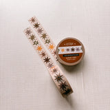 Removable Washi craft tape for journaling and gift wrapping; featuring whimsical celestial stars on a cream background.

15mm x 10m
Shrink wrap packaging with label