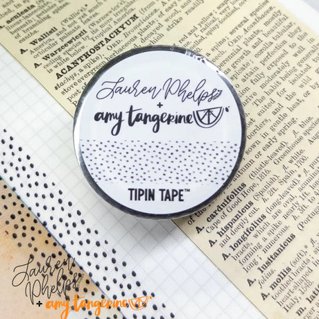 Do you love adding interactive elements to your scrapbook layouts like photos, journaling cards, patterned paper, ephemera, and keepsakes, but want a clean, professional way to attach them without bulky adhesives or visible hinges?

Tip In Tape™ was designed for exactly that.

Tip In Tape™ is a clear matte PET tape created for adding interactive elements to scrapbook pages and paper crafting projects with precision and ease. It allows you to create flip-ups, tip-ins, layered details, and movable elements wh