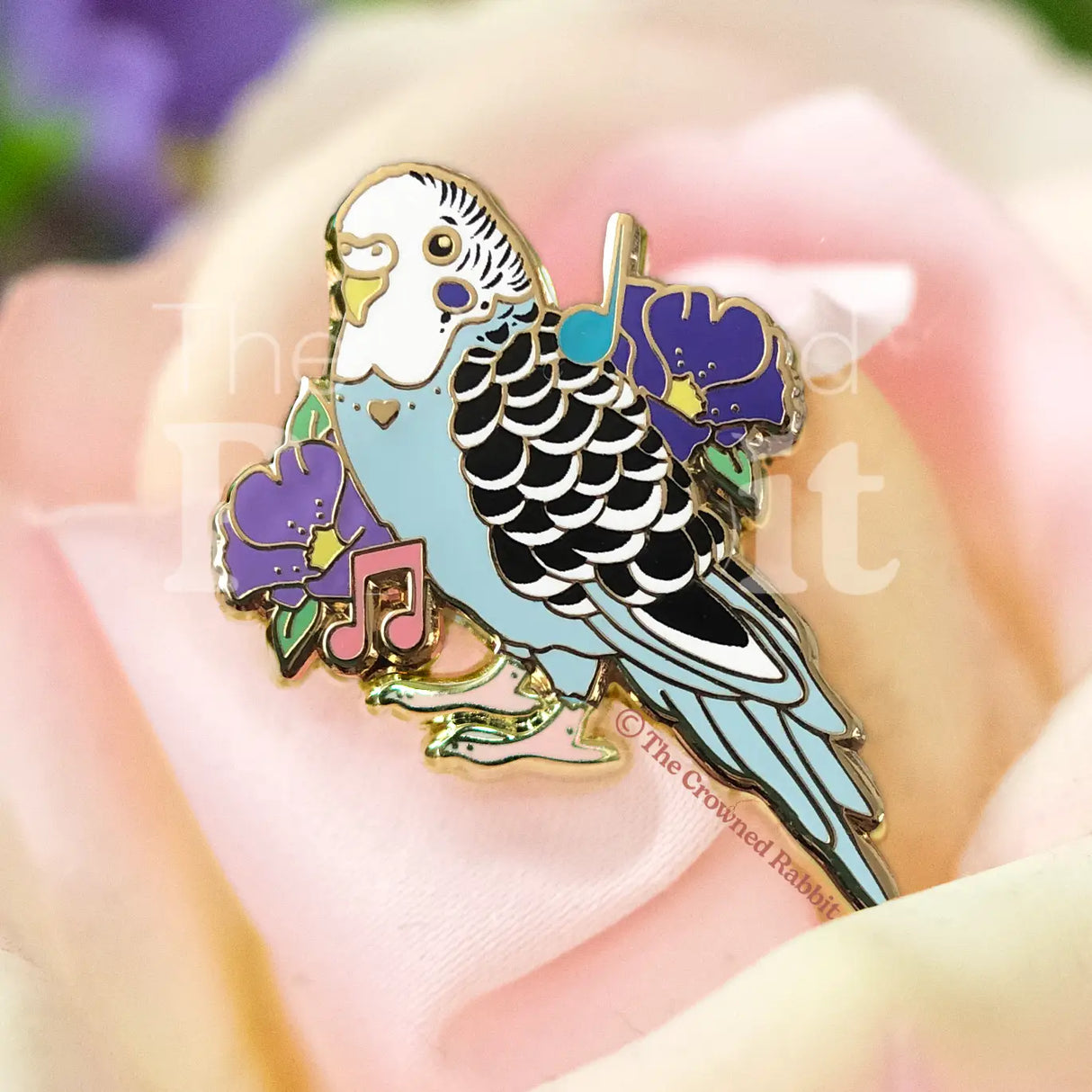 Sweet Parakeet pin for the bird and pet lover!

✦ Hard enamel
✦ Shiny gold metal
✦ 2 inches
✦ 2 Posts for extra security
✦ Rubber backings
✦ Back stamped for authenticity

Comes packaged on a backing card.