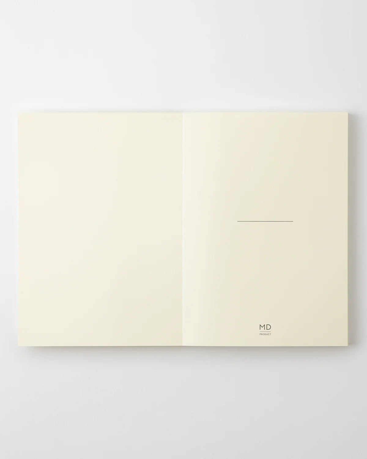 Crafted in Japan, this minimalist notebook is designed to enhance your writing experience. Inside, you'll find the high-quality Midori Diary (MD) paper, first developed in 1960 and refined ever since. Midori has rigorously tested this paper with various writing instruments to ensure quality, checking for ink feathering or bleeding, drying time, the smoothness of pen tips on the surface, and the tactile feel.