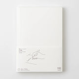 Crafted in Japan, this minimalist notebook is designed to enhance your writing experience. Inside, you'll find the high-quality Midori Diary (MD) paper, first developed in 1960 and refined ever since. Midori has rigorously tested this paper with various writing instruments to ensure quality, checking for ink feathering or bleeding, drying time, the smoothness of pen tips on the surface, and the tactile feel. The result is a paper that resists bleeding and feathering and is fountain-pen friendly, ensuring a 