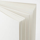 Crafted in Japan, this minimalist notebook is designed to enhance your writing experience. Inside, you'll find the high-quality Midori Diary (MD) paper, first developed in 1960 and refined ever since. Midori has rigorously tested this paper with various writing instruments to ensure quality, checking for ink feathering or bleeding, drying time, the smoothness of pen tips on the surface, and the tactile feel. The result is a paper that resists bleeding and feathering and is fountain-pen friendly, ensuring a 