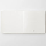 Crafted in Japan, this minimalist notebook is designed to enhance your writing experience. Inside, you'll find the high-quality Midori Diary (MD) paper, first developed in 1960 and refined ever since. Midori has rigorously tested this paper with various writing instruments to ensure quality, checking for ink feathering or bleeding, drying time, the smoothness of pen tips on the surface, and the tactile feel. The result is a paper that resists bleeding and feathering and is fountain-pen friendly, ensuring a 