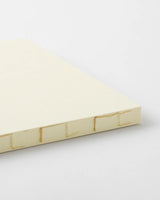 Side profile of the MD Notebook Thick A5 Square highlighting its extra‑thick page block.