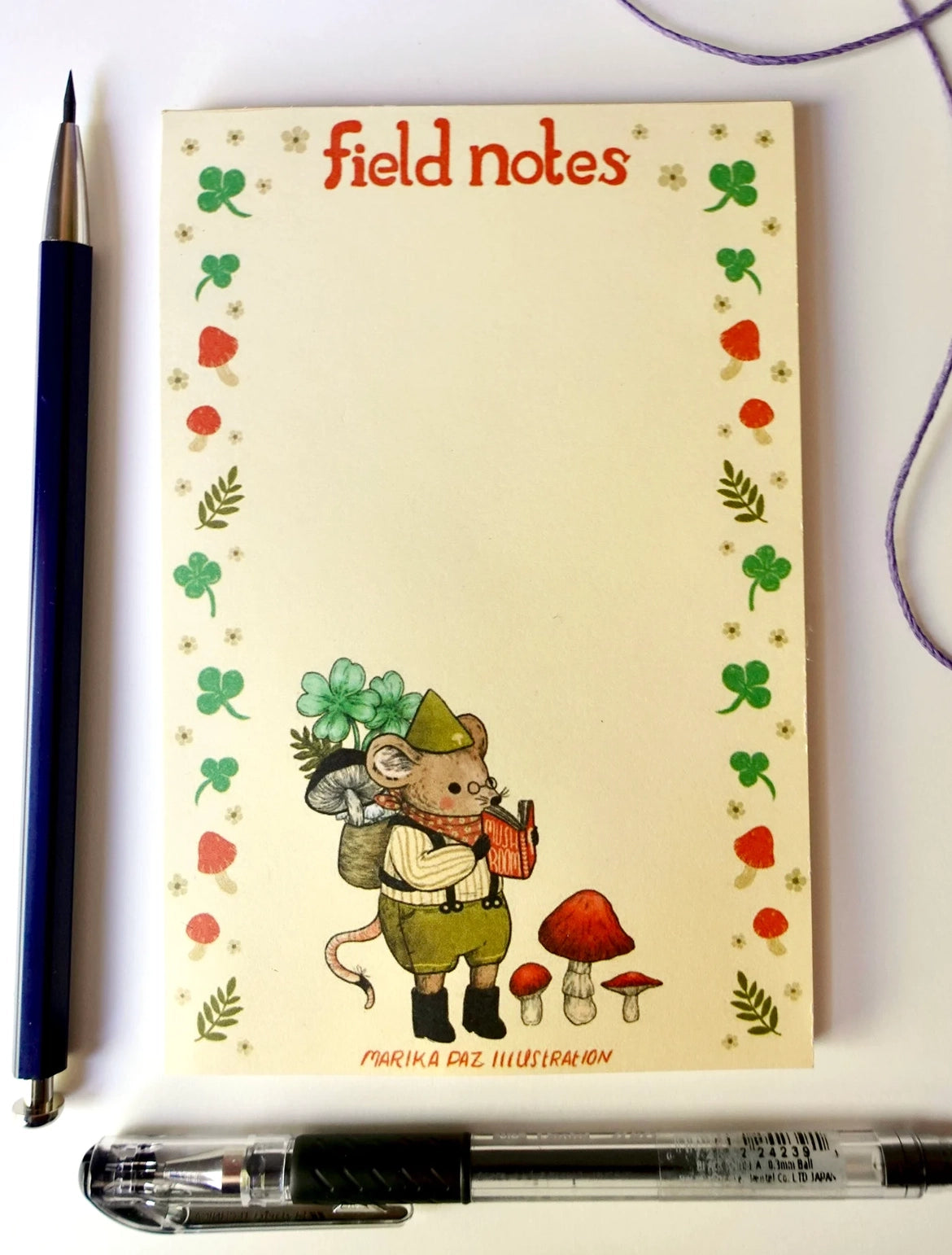 Marika Paz Illustration - Field Notes Notepad

A little field mouse goes mushroom foraging. This notepad is great for field notes, lists, and more!

Notepad is 4 x 6", 50 pages of 70lb paper. Comes in a cello sleeve for protection.

Printed in USA