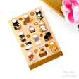 This vinyl sticker sheet features charming cat bakers decorating cakes, frosting cookies, and preparing all sorts of yummy goodies. Brighten up your belongings with these sweet, durable stickers that stick to laptops, water bottles, journals, and more. Perfect for anyone who adores cats and baking.

4x6 Sheet
Vinyl Sticker
Colors might vary just a bit from your screen.
