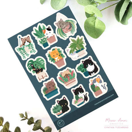 This vinyl sticker sheet features cats and plants. Brighten up your belongings with these sweet, durable stickers that stick to laptops, water bottles, journals, and more.&nbsp;

4x6 Sheet
Vinyl Sticker
Colors might vary just a bit from your screen.