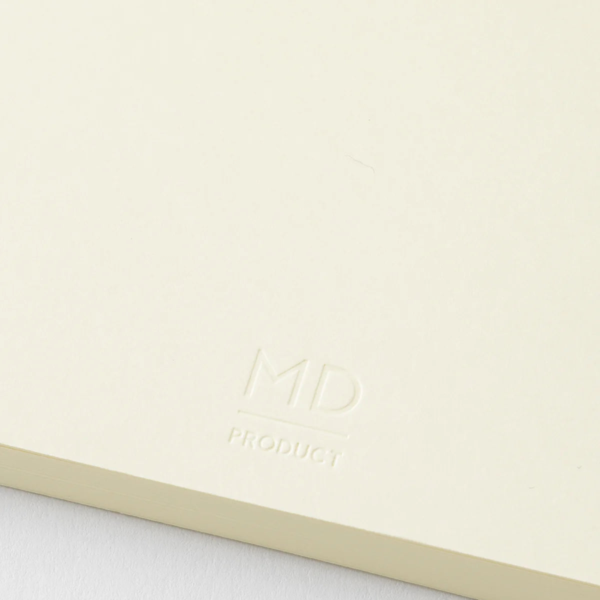 Crafted in Japan, this minimalist notebook is designed to enhance your writing experience. Inside, you'll find the high-quality Midori Diary (MD) paper, first developed in 1960 and refined ever since. Midori has rigorously tested this paper with various writing instruments to ensure quality, checking for ink feathering or bleeding, drying time, the smoothness of pen tips on the surface, and the tactile feel. The result is a paper that resists bleeding and feathering and is fountain-pen friendly, ensuring a 