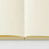 Crafted in Japan, this minimalist notebook is designed to enhance your writing experience. Inside, you'll find the high-quality Midori Diary (MD) paper, first developed in 1960 and refined ever since. Midori has rigorously tested this paper with various writing instruments to ensure quality, checking for ink feathering or bleeding, drying time, the smoothness of pen tips on the surface, and the tactile feel. The result is a paper that resists bleeding and feathering and is fountain-pen friendly, ensuring a 