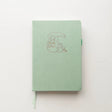 Bunny Spirit Journal in Sage Green with Gold Foil Logo🌱

Product Details:

Size: A5 (5.70 x 8.26 inches)
160 Dotted Grid Pages (5 x 5 mm)
2 Bookmarks
Elastic Band and Pen Holder
Expandable storage compartment