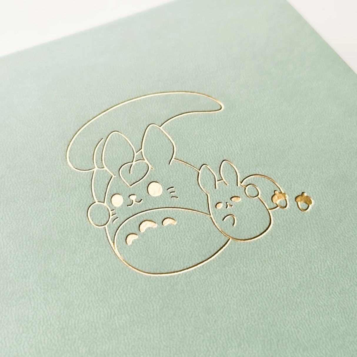 Bunny Spirit Journal in Sage Green with Gold Foil Logo🌱

Product Details:

Size: A5 (5.70 x 8.26 inches)
160 Dotted Grid Pages (5 x 5 mm)
2 Bookmarks
Elastic Band and Pen Holder
Expandable storage compartment